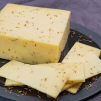 Queso saborizado al ajo orgánico (precio por 100 gramos)